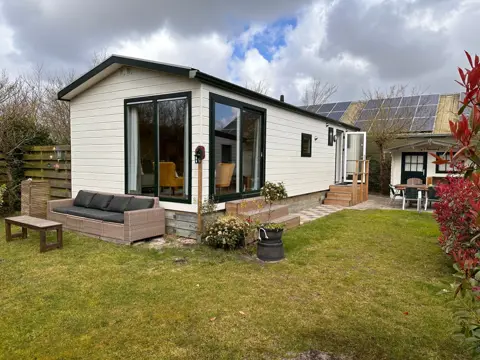 Vrijstaand chalet op vakantiepark aan rand van het bos