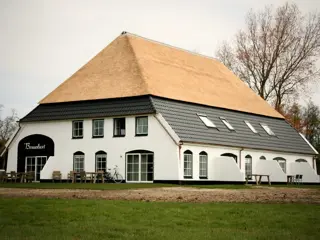 Appartement in grote en sfeervolle boerderij nabij het Krimbos