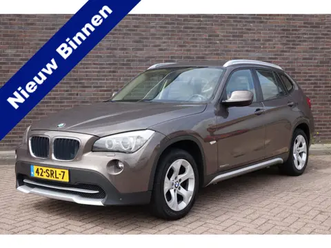 BMW X1 sDrive20i Business, leder, trekhaak afneembaar, navi, camera, keurige auto