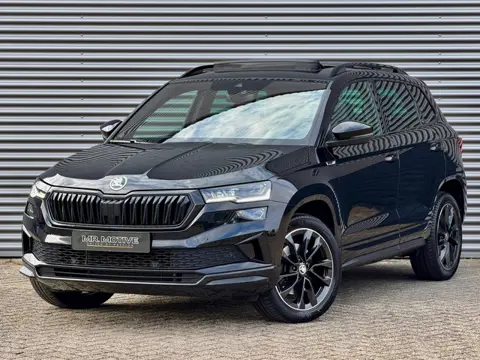 Skoda Karoq 1.5 TSI ACT Sportline Business | Panorama | Trekhaak | Leder | Camera | Matrix LED | 1e 