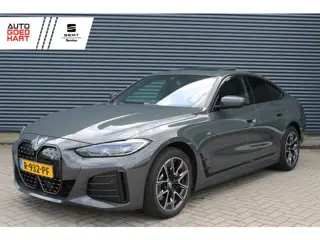BMW i4 eDrive40 84 kWh M-Sport SOH-100% Dravitgrau Schuif-/kanteldak Leer Harman-Kardon Camera