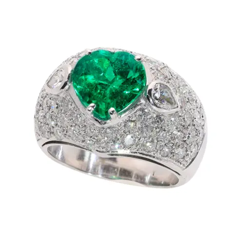 A Bold Vintage Ring with a Colombian Emerald Heart and Diamonds, circa 1990