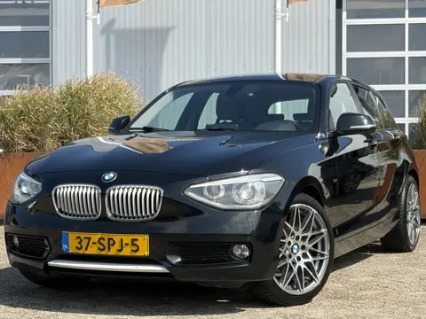 BMW 1-serie 116i Business 136pk | Airco automatisch | Bi-xenon koplampen | Cruise control | Lichtmet