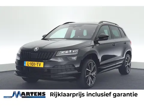 Skoda Karoq 1.5 TSI ACT 150pk DSG Sportline Business Camera Stoelverwarming LED