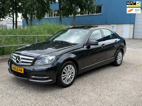 Mercedes-Benz C-klasse 180 Prestige Elegance 1e Eigenaar Opendak! 55.000 KM NAP! Navi! PDC!