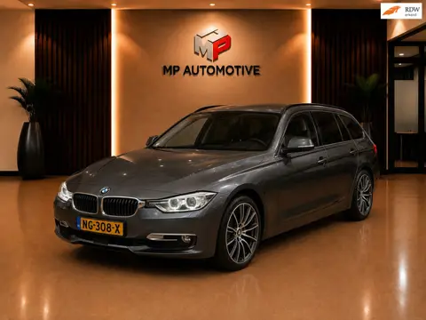 BMW 3-serie Touring 330d Upgrade Edition|AUT|Trekhaak|Camera|Navi|Cruise|