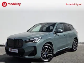 BMW iX1 eDrive20 67 kWh M-Sport SOH 99% Driving Assist. Plus | Sportstoelen | Park Assist | Leer | A