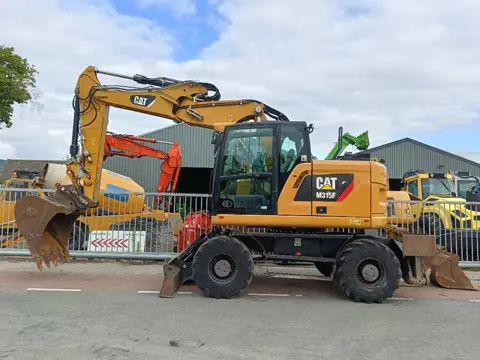 Cat M 315 F mobiele graafmachine excavator bagger