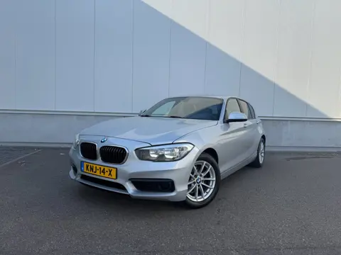 BMW 1-serie 116i - Airco / Navi / Cruise / PDC / Leder / Elektr. ramen / Lm velgen