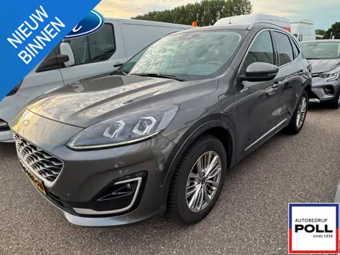 Ford Kuga 2.5 PHEV Vignale Full-Options Trekhaak HUD Adapt. Cruise Elek. Klep Dodehoek detectie Fabr