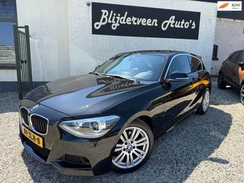 BMW 1-serie 114i Business+ Clima | Leer | Navi | LM | PDC | Stoel VW
