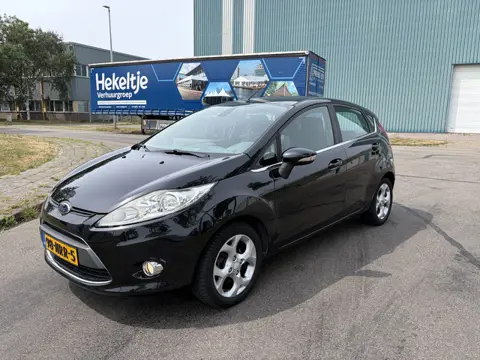 Ford Fiesta 1.25i Titanium 5-Deurs 82 PK. Leuke en zeer fijn rijdende auto met goed onderhoud in het