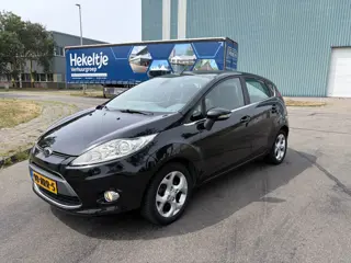 Ford Fiesta 1.25i Titanium 5-Deurs 82 PK. Leuke en zeer fijn rijdende auto met goed onderhoud in het