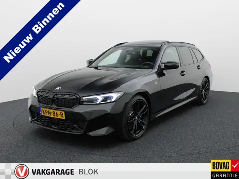 BMW 3 Serie Touring M340i xDrive | Pano | Keyless | Memory | Trekhaak | Laser | Head Up | 19'' | Pri