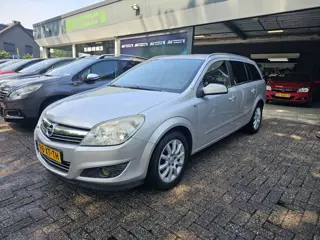 Opel Astra Wagon 1.6 Cosmo | 1E EIGENAAR | 3/6 OF 12MND GARANTIE | LEER | CRUISE| NAVI | STOELVERWAR