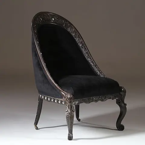 Koloniale dames-zetel massief ebbenhout ca 1800 met zwarte velours en 2 olifanten kopjes