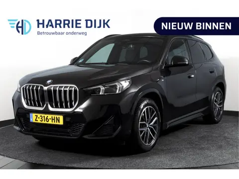 BMW X1 sDrive18i 136 PK | M-Sport | Afn. Trekhaak | Dig. Cockpit | Cruise | PDC | Camera | NAV + App