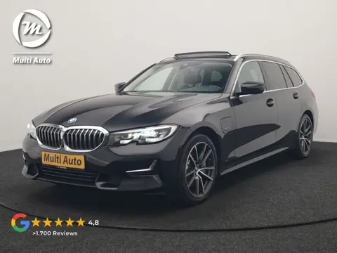 BMW 3 Serie Touring 330e Luxury Line PHEV 293pk Dealer O.H. | Trekhaak Af Fabriek | Panodak | 360 Ca