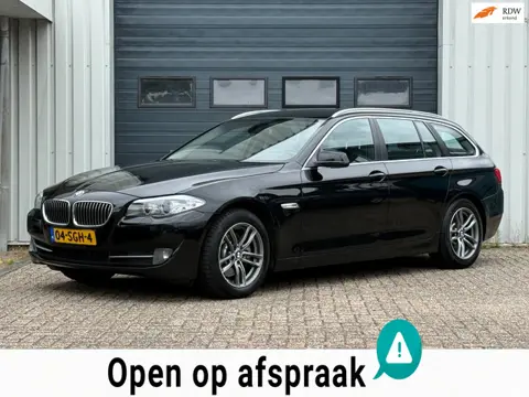 BMW 5-serie Touring 523i Executive NAVI / LEER / CRUISE