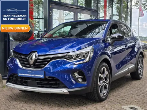 Renault Captur 1.6 E-Tech Hybrid 145 Intens | PDC + Camera | Navigatie | LM velgen | Apple CarPlay/A