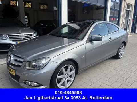 Mercedes-Benz C-Klasse Coupé 180 NL AUTO/PANORAMA/LEDER