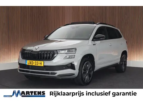 Skoda Karoq 1.5 TSI DSG Sportline Business Panoramadak Navigatie Camera LED Trekhaak Stoelverwarming