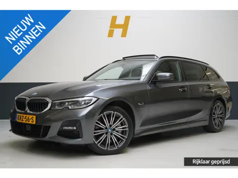 BMW 3-serie Touring 330e High Executive | SoH 90% | Panoramadak | Trekhaak | Memory | Stuurverwarmin