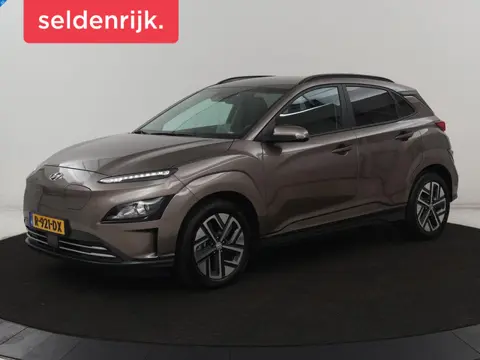 Hyundai Kona EV Fashion 64 kWh | SOH 100% | 3 Fase | Head-Up |  Warmtepomp | Adaptive cruise | Camer