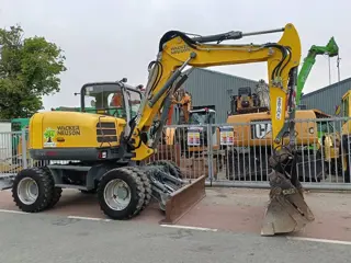 Neuson ew100 11 ton exacvator bagger graamachine mobile