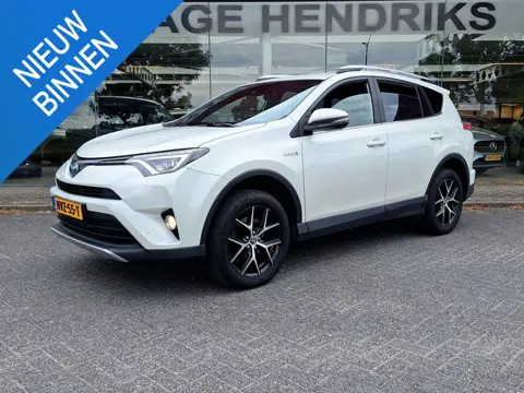 Toyota RAV4 2.5 Hybrid AWD Style | Trekhaak 1650kg!| Leder-Stof | CarPlay / Android Auto | Camera | 