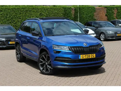 Škoda Karoq 2.0 TSI 4x4 Sportline Business / NL Auto! / Trekhaak / Panoramadak / Camera / CarPlay / 