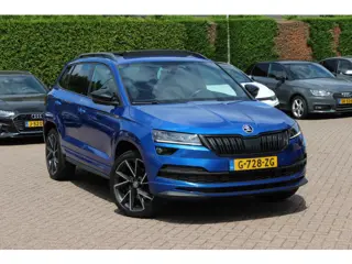Škoda Karoq 2.0 TSI 4x4 Sportline Business / NL Auto! / Trekhaak / Panoramadak / Camera / CarPlay / 