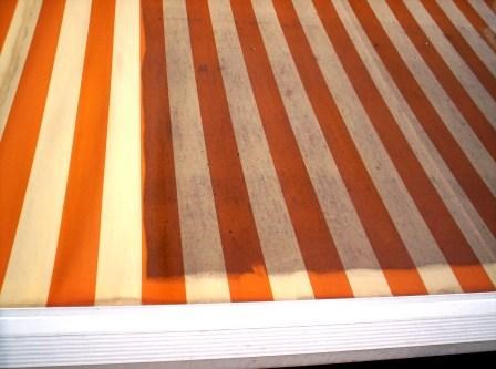 Reinigen makiezen Schoonmaken zonwering groene aanslag