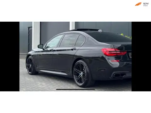 BMW 7-serie 750Li M Sport zwart zwart carbon zeer mooie auto! High executive