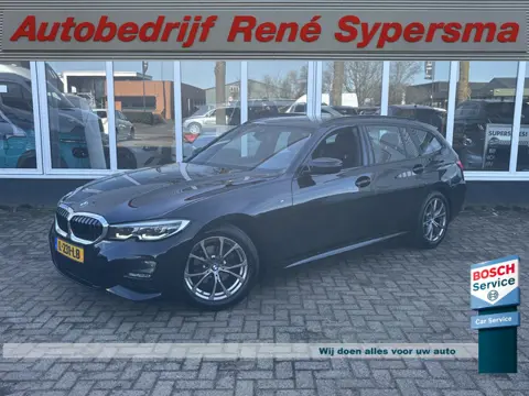 BMW 3 Serie Touring 318i Business Edition | M Pakket | Sfeerverlichting | Apple Carplay | Parkeercam