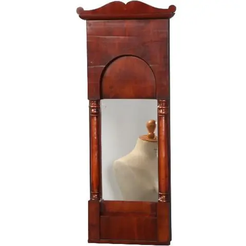 Biedermeier spiegel getoogd en met zuiltjes in donker bloemmahonie ±1830