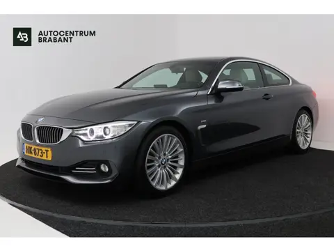 BMW 4 Serie Coupé 420i Luxury (GROOT-NAVIGATIE, SPORTSTOELEN, STOELVERWARMING, PDC, DEALER ONDERHOUD