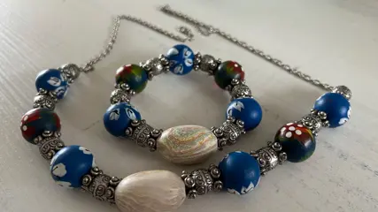 Prachtige exclusieve houten kralenketting inclusief bijpassende armband