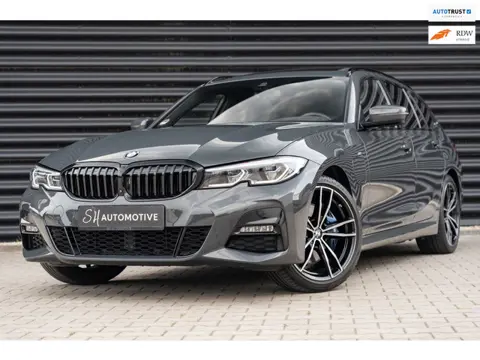 BMW 3-serie Touring 330e High Executive M Sport / DRAVIT GRAU / PANO / 360 CAMERA / HUD / CARBON / T