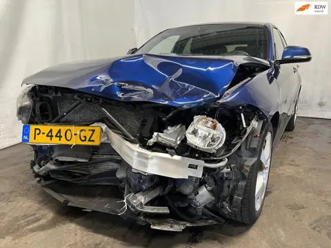 BMW 1-serie 125i High Executive - Front Schade