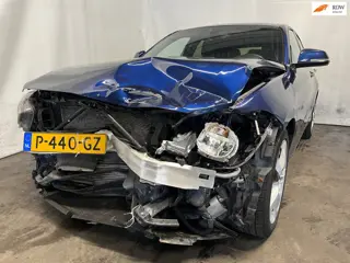 BMW 1-serie 125i High Executive - Front Schade