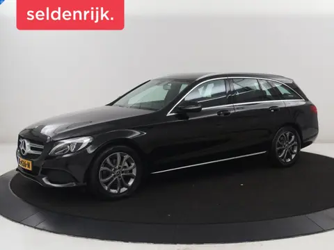 Mercedes-Benz C-klasse Estate 180 Business Solution | Half leder | Stoelverwarming | Navigatie |  Bl