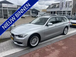 BMW 3 Serie Touring 320i High Executive Navi Leder 184 PK Nw staat 1 eig