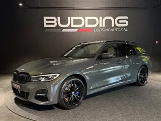 BMW 3 Serie Touring 330e xDrive High Exe | M-sport | Dravitgrau | Pano | Trekhaak | Memory