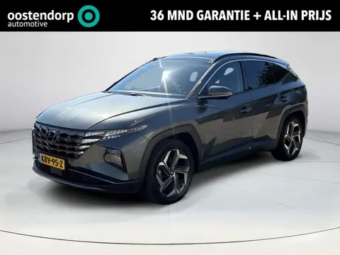 Hyundai Tucson 1.6 T-GDI PHEV Premium Sky 4WD | SOH 97,4% | Panoramisch schuif/kantel dak | Apple Ca