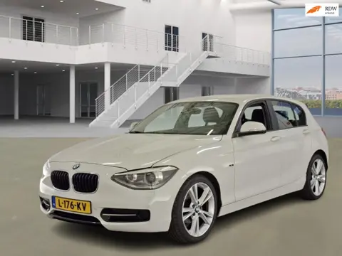 BMW 1-serie 116i Business+ AIRCO CRUISE NAVI PDC TREKHAAK