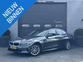 BMW 3-serie 320i xDrive High Executive Edition | Navigatie | Head-Up Display | DAB | Privacy Glass |