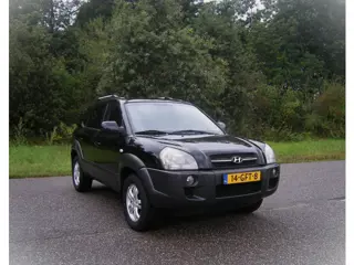 Hyundai Tucson 2.0i Style Premium . Airco . Leder . Cruiscontrol . LMV . enz