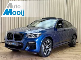 BMW X4 xDrive20i *M-Sport* Phytonicblau / Panoramadak / Leder / HUD / Stoelverwarming / Camera / 20"