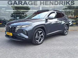 Hyundai Tucson 1.6 T-GDI PHEV Premium Sky 4WD | Full Options! | Dealer onderhouden! | Trekhaak | Pan